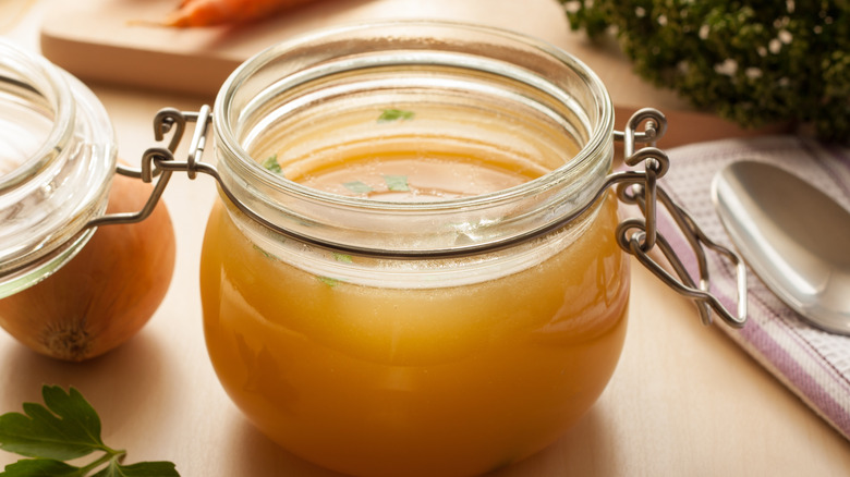 chicken stock in glass jar