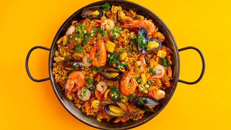Paella on a yellow background