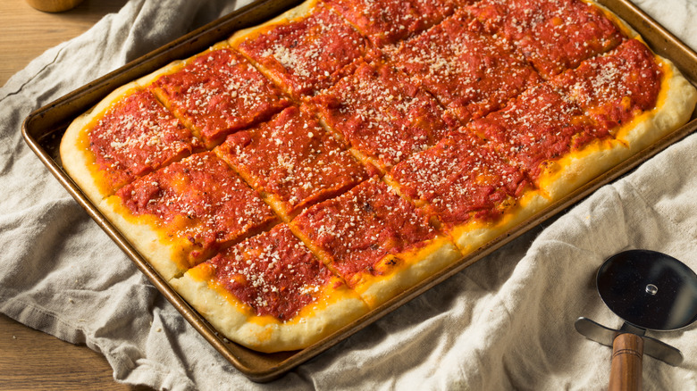 pan with rectangular tomatoe pie