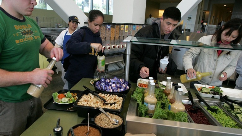 College students at salad bar