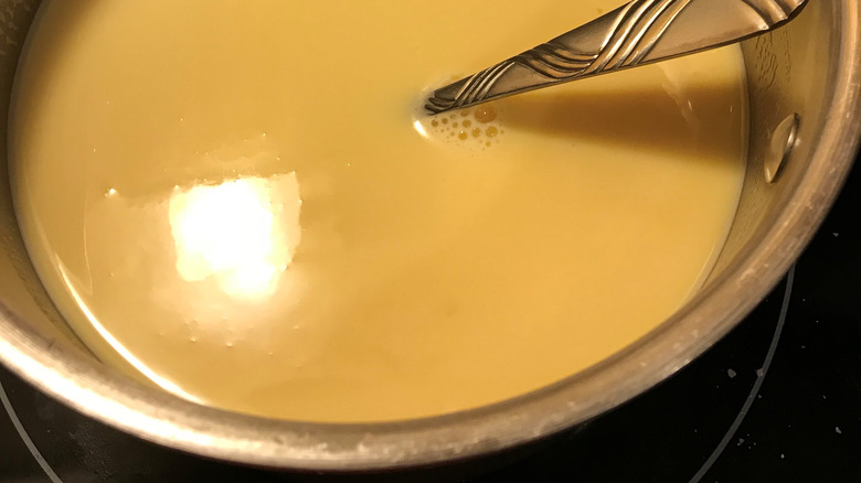 Cooking custard over stove