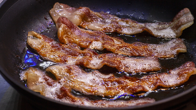 Bacon frying in pan