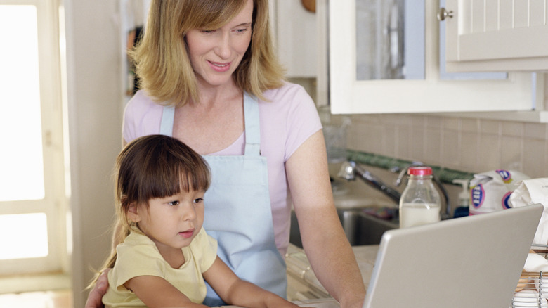 Woman looking at online recipe