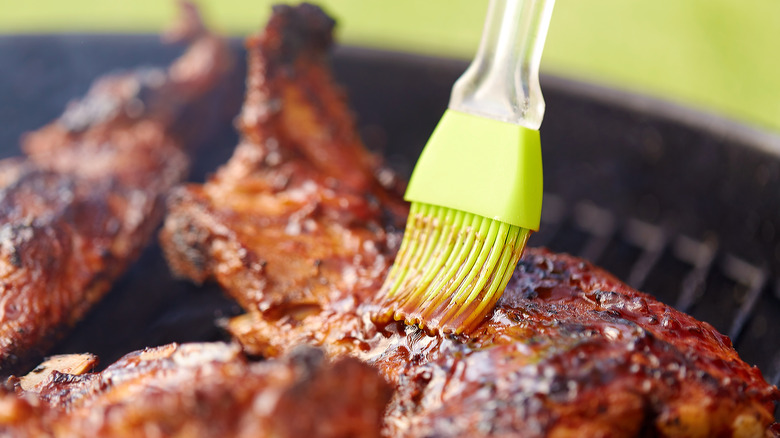 Basting brush applying barbecue sauce