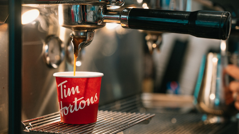 Tim Hortons cup under espresso machine