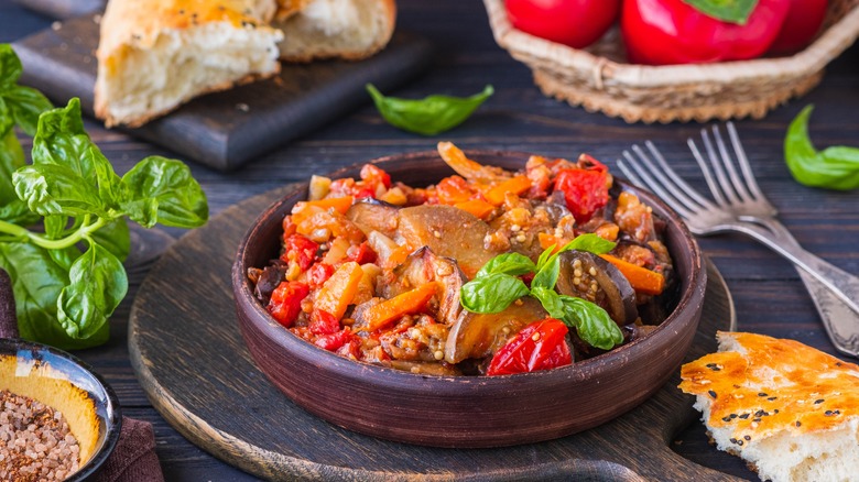 bowl of ajapsandali on wooden paddle