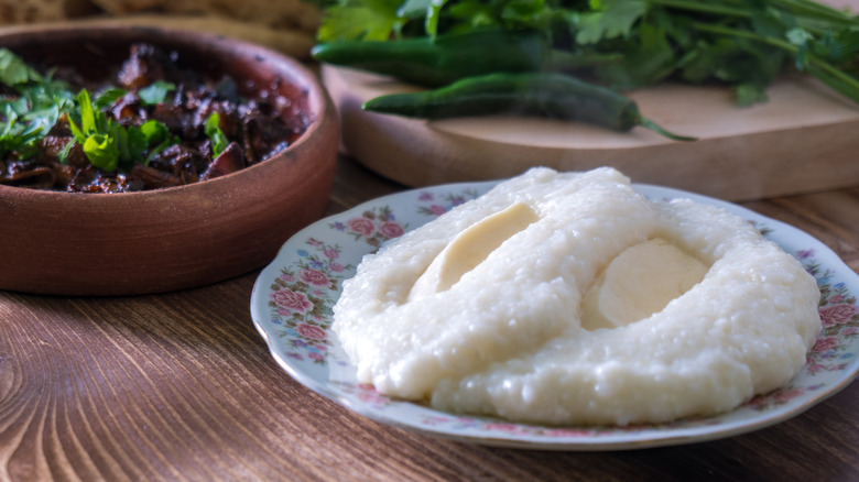 ghomi on plate with cheese