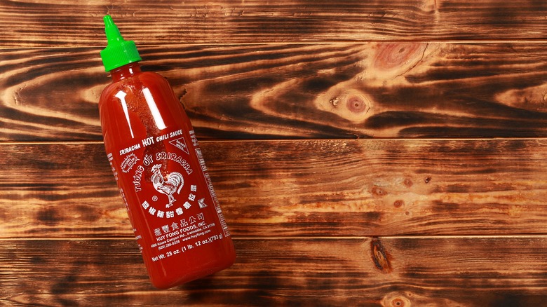 Huy Fong Sriracha on wood