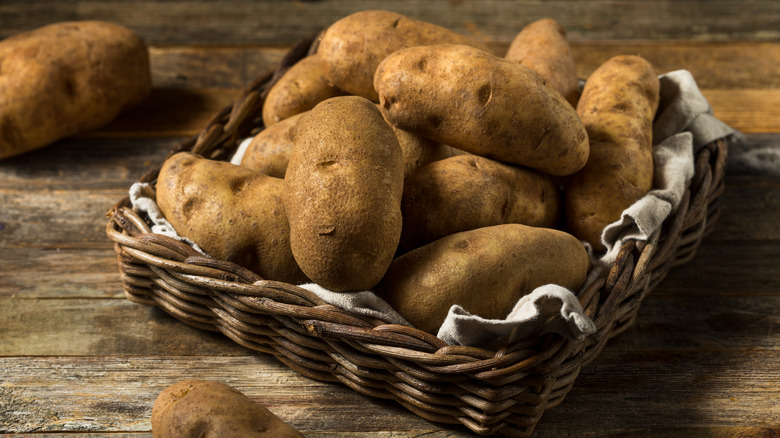 Russet potatoes in basket