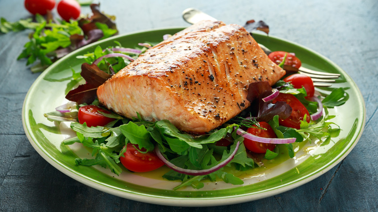 salmon steak on salad