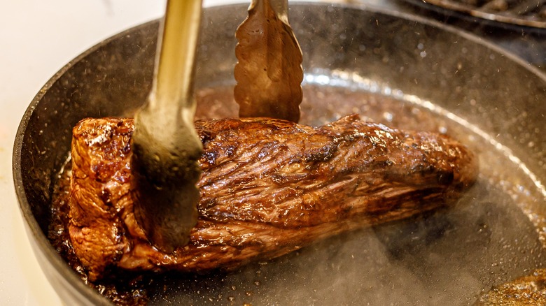 Beef tenderloin in frying pan