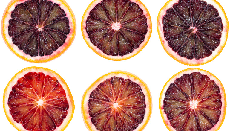 Six halved blood oranges