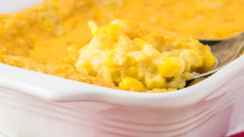 Spoon scooping corn casserole