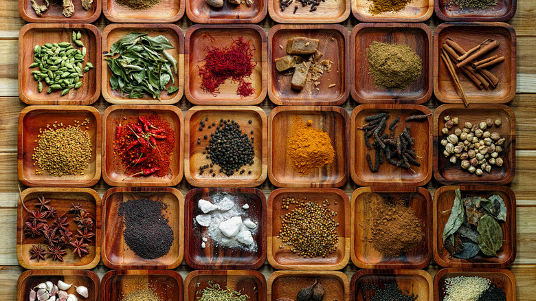 trays of herbs and spices