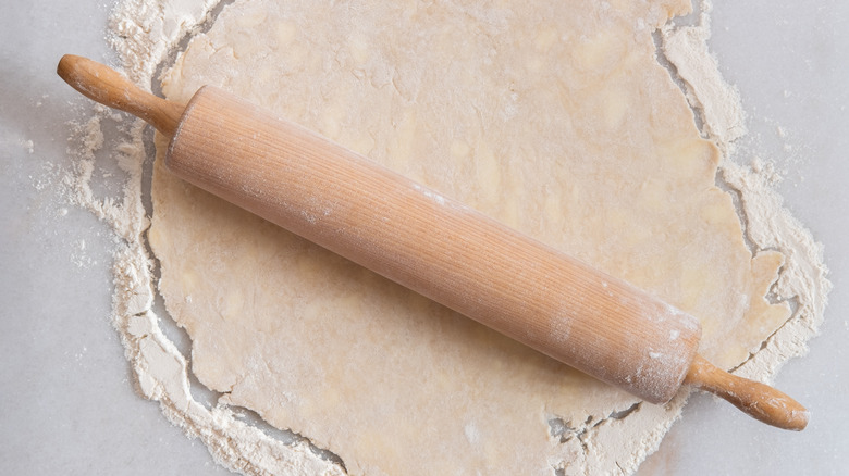 Pie dough and rolling pin