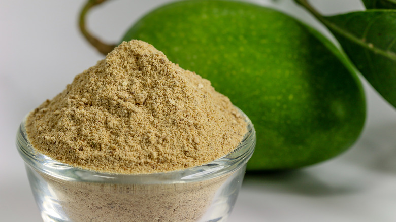 Dried mango powder in bowl