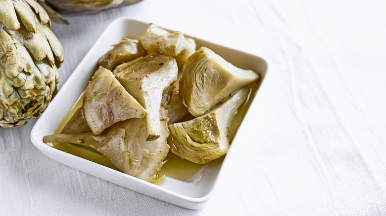 Cut artichoke with olive oil