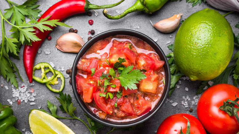 Bowl of salsa and ingredients