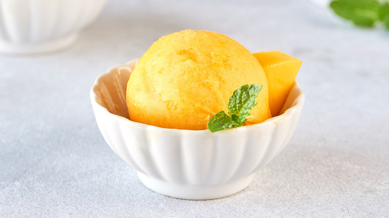 Mango sorbet with mint leaf