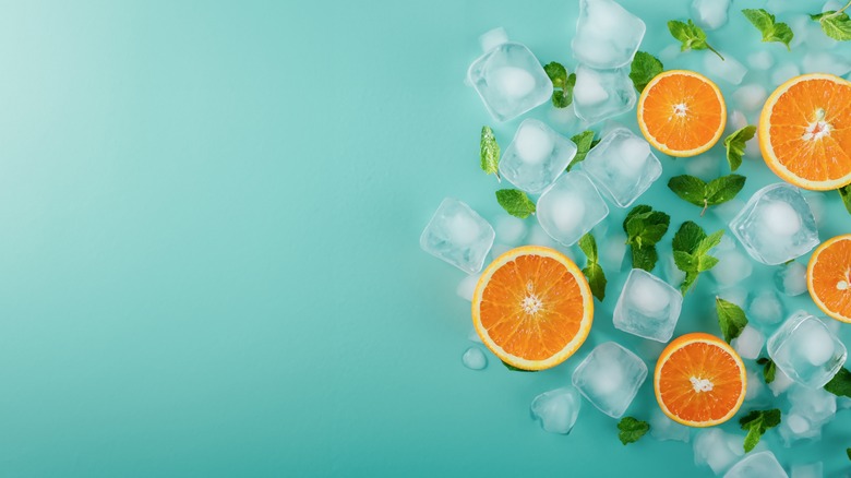 Ice cubes with oranges