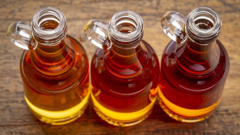 Three bottles of maple syrup