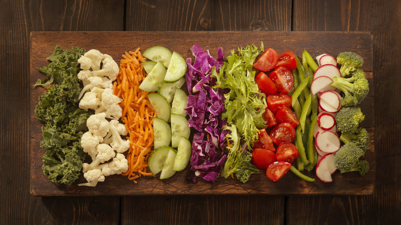 Chopped vegetables on wood board