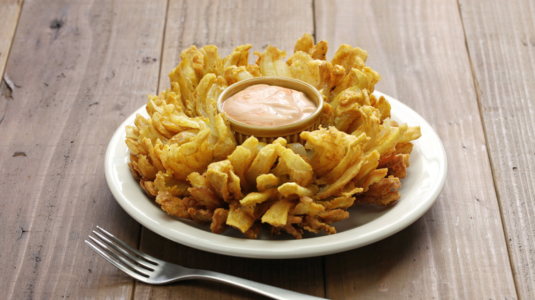 blooming onion with sauce in middle