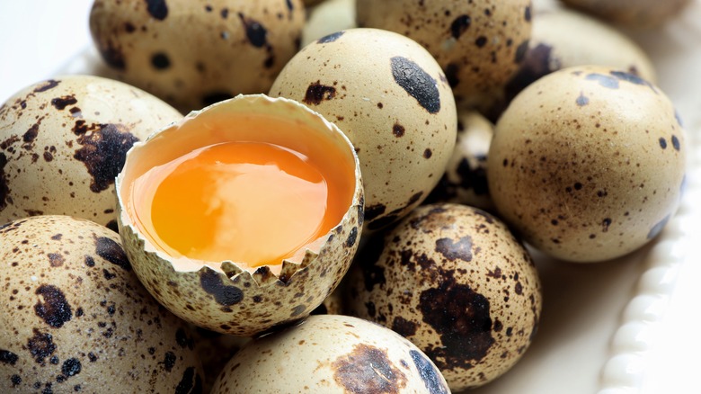 cracked and whole quail eggs