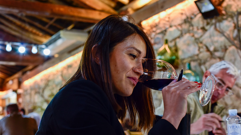 Woman enjoying red wine