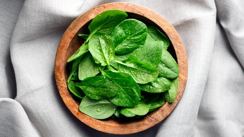 bowl of baby spinach leaves