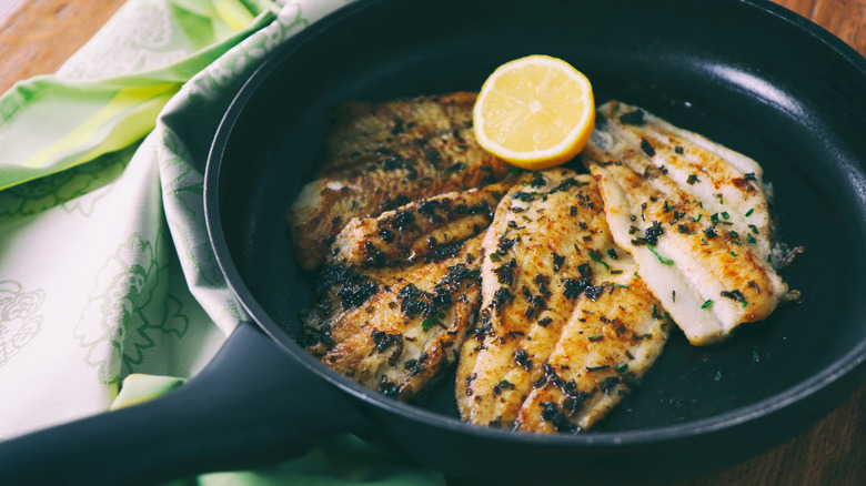 Cooked flounder in a pan