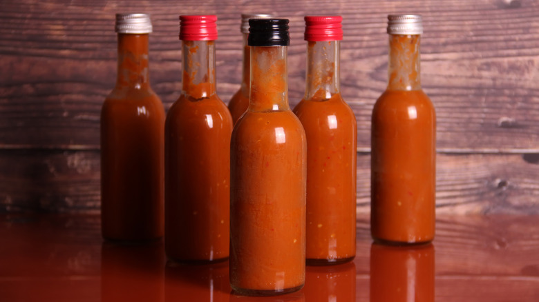 bottles of red hot sauce