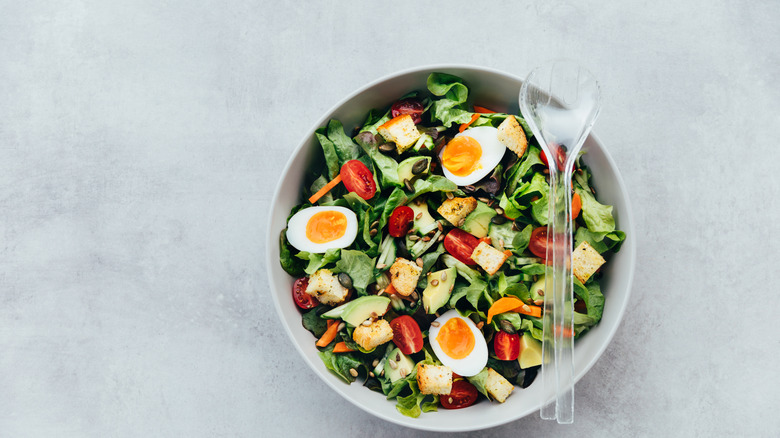 Bowl of salad with egg 