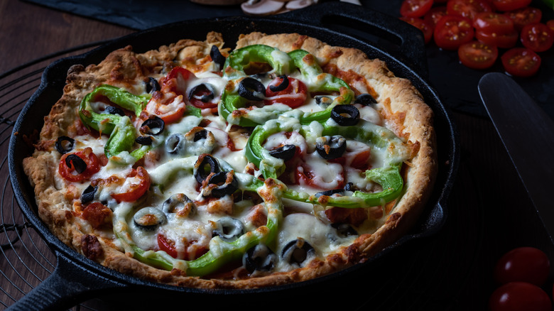 deep dish pizza in skillet