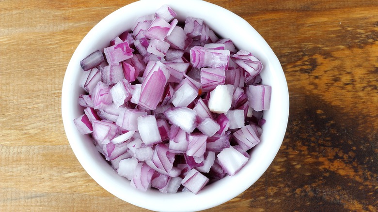 diced red onions in ramekin