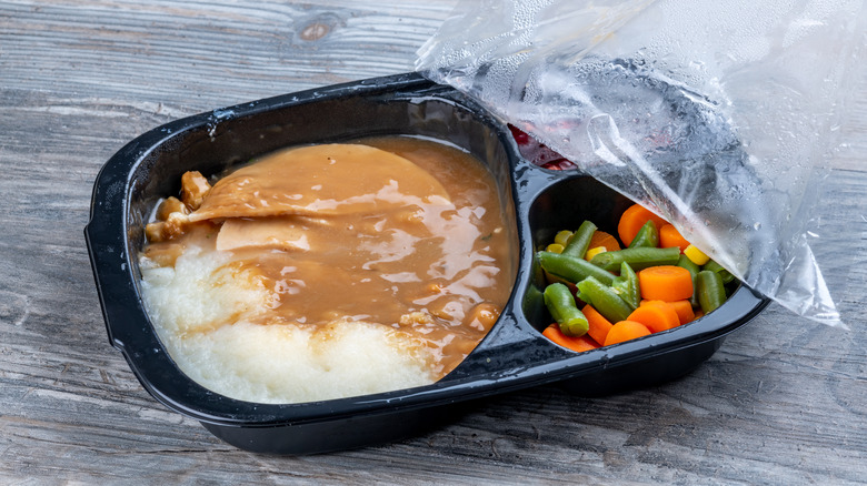 TV dinner with turkey, gravy, vegetables