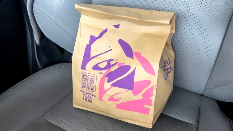 Taco Bell bag in car