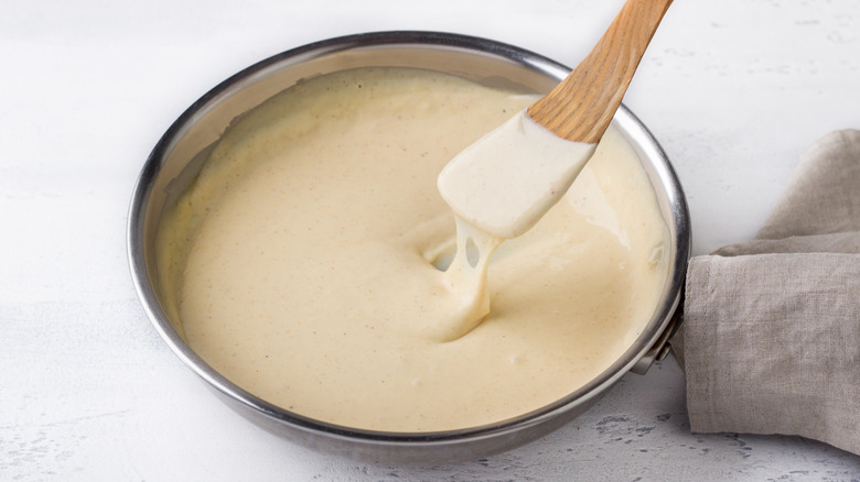 cheese sauce in saucepan