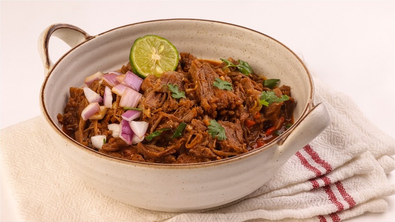 Birria in pan on towel