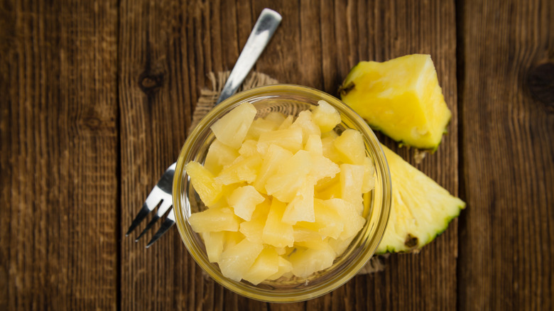 Crushed pineapple with fork