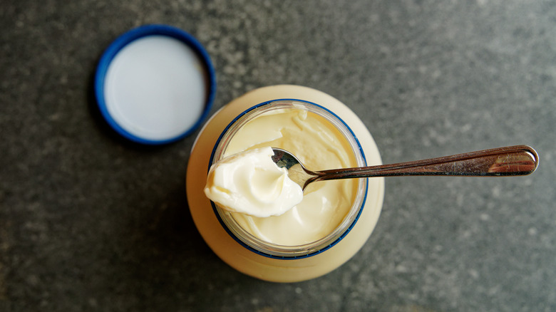 Spoonful of mayo from jar