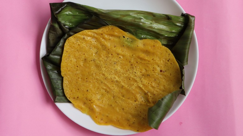 Unwrapped panki on banana leaf