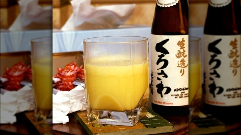 Tamagozake next to sake bottle 