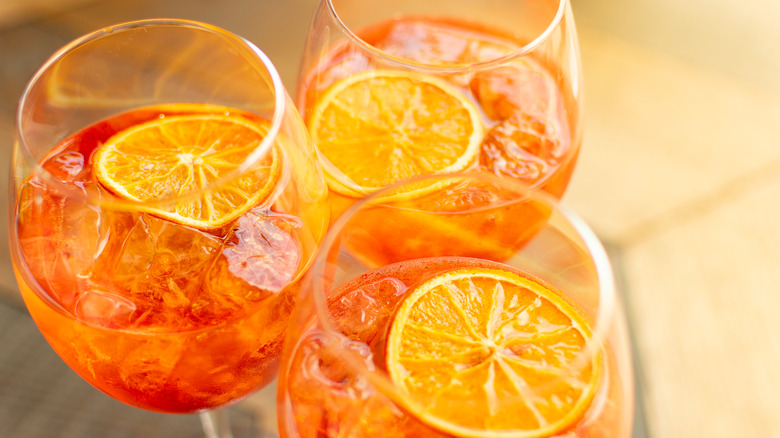 aperol spritzes with a garnish