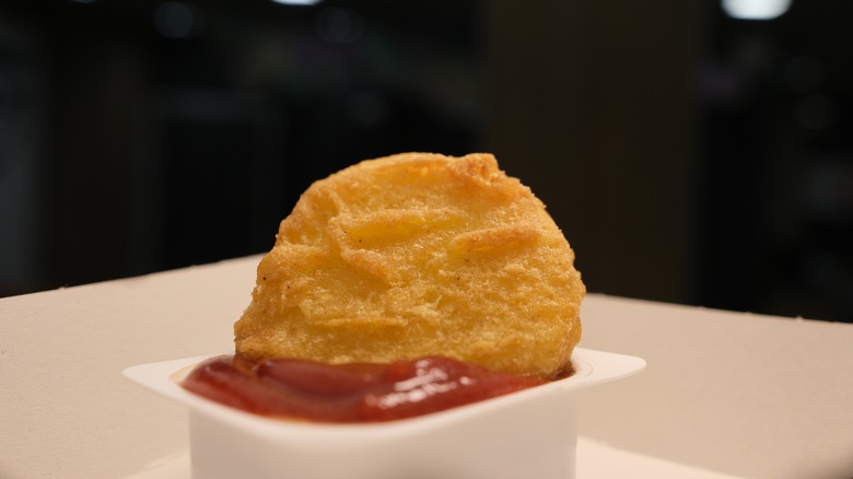 Chicken McNugget in sauce pot