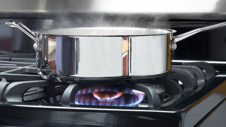 skillet steaming on a stove