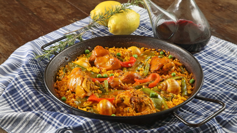 Paella in pan on table