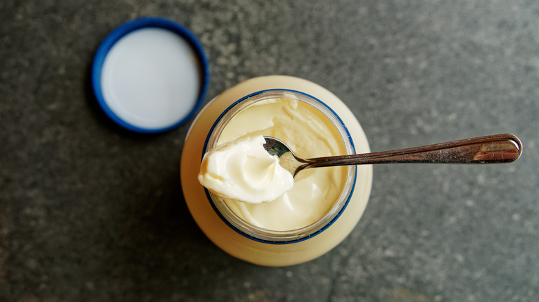 Jar of mayonnaise with spoon