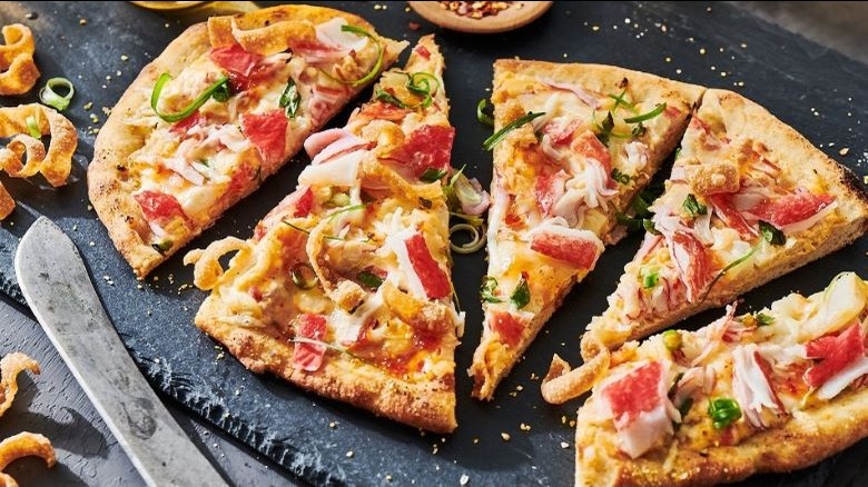 Pizza topped with imitation crab