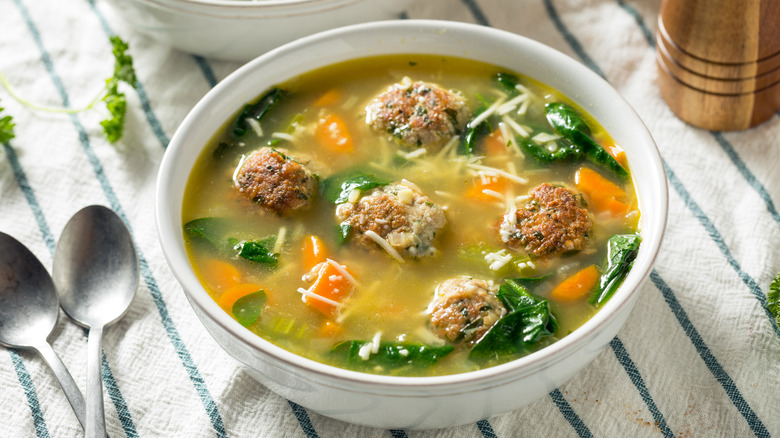 Meatball soup in white bowl